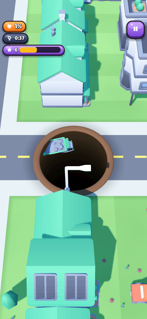 A garbage truck tipping into the hole at a crossroads